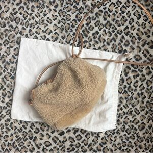 Cozy Tan Shearling Crossbody clutch Mansour Gavrielli cloud